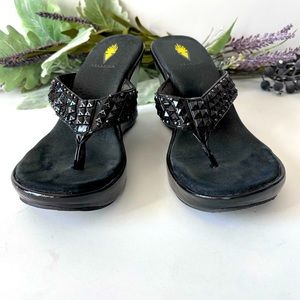 Volatile wedge flip flop. Jeweled straps size 9 pre owned. Black